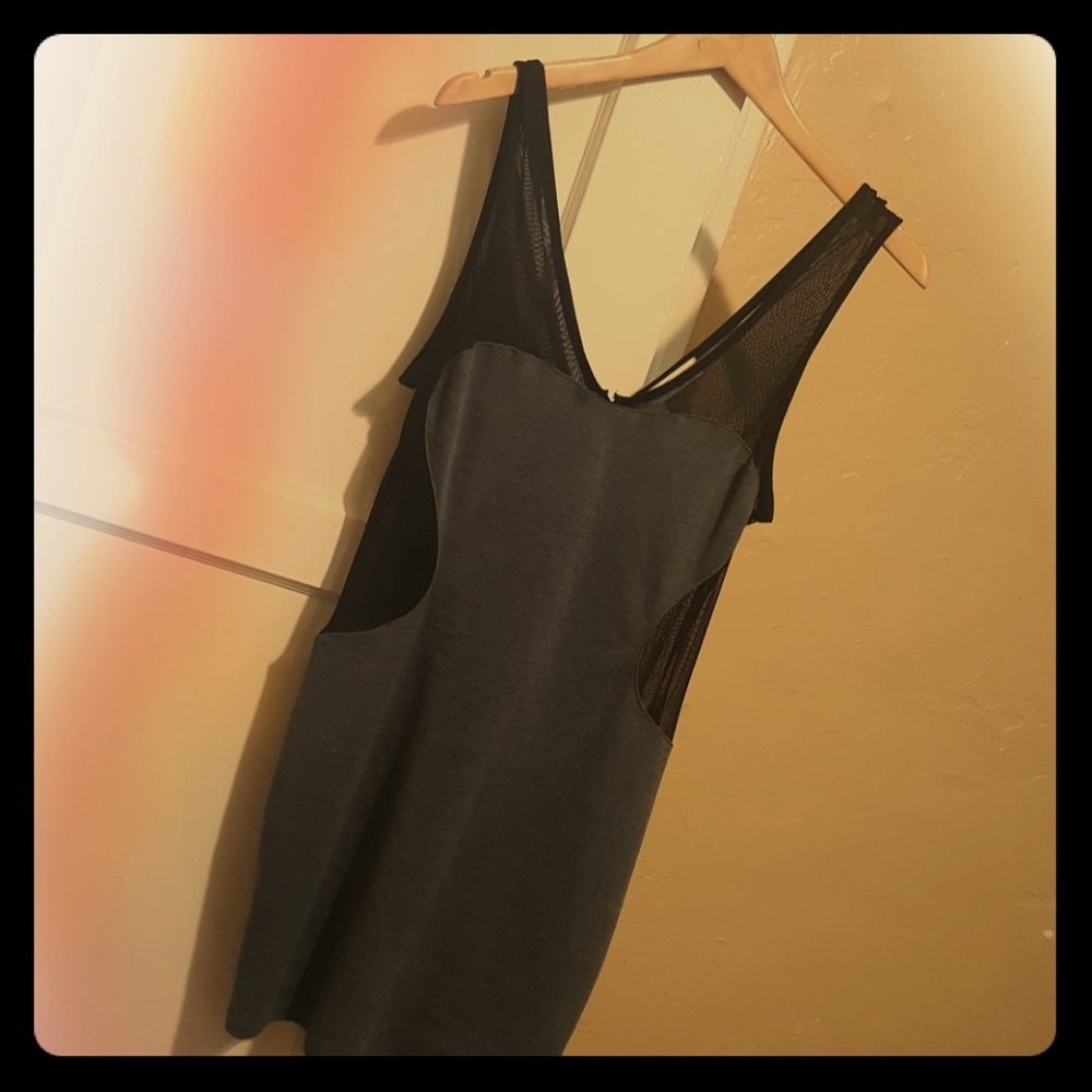 NWT Black mini dress with see-thru back!